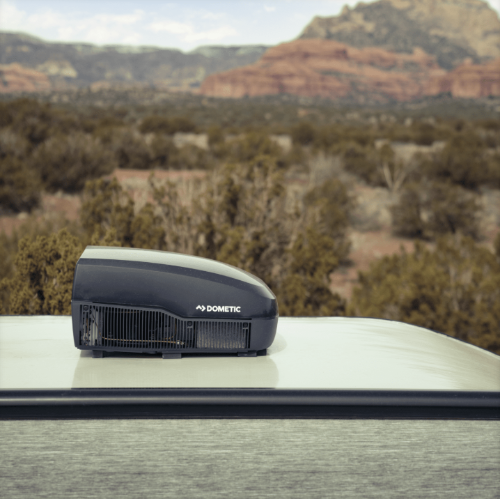 Dometic A/C installed on top of RV camper in a desert location